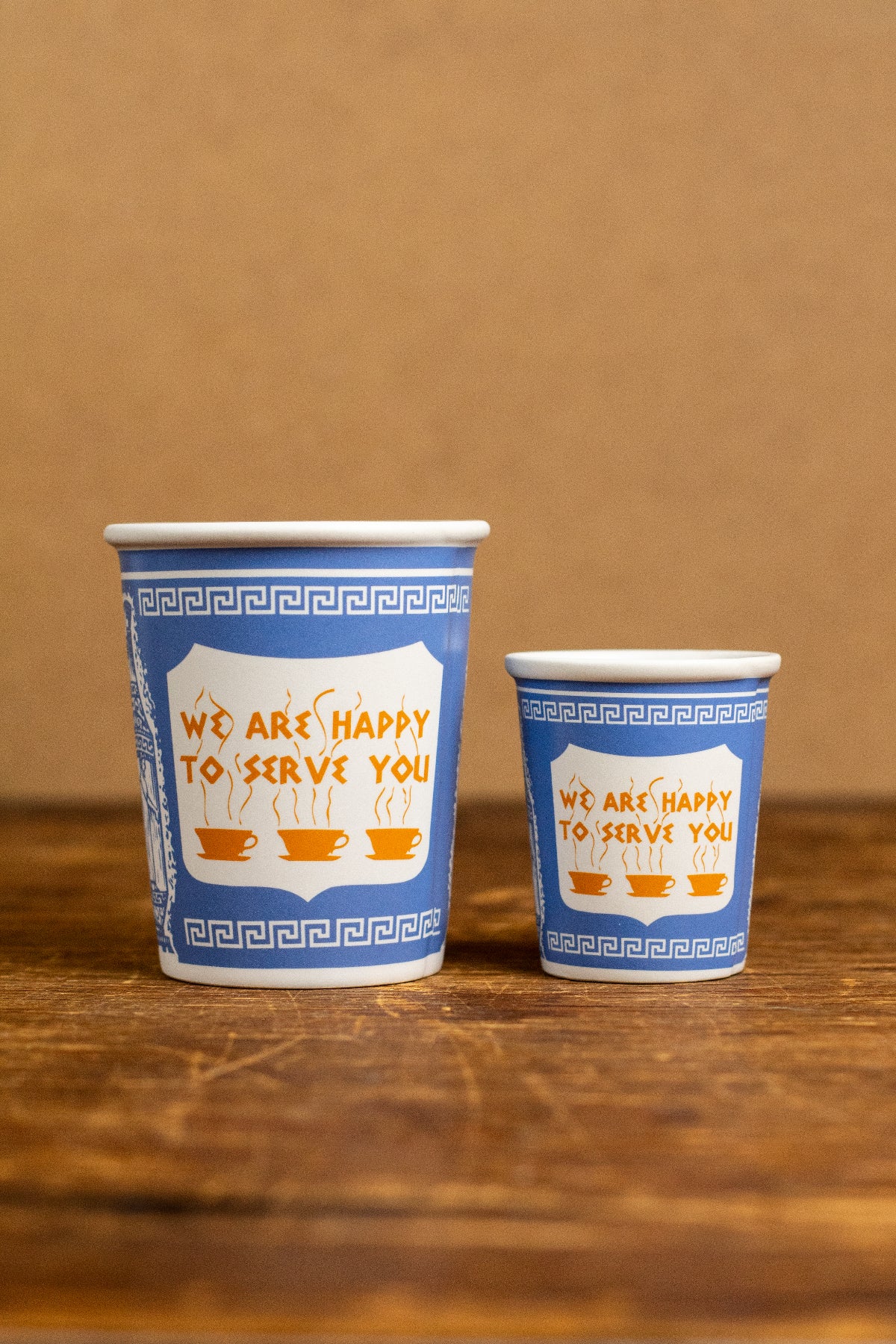 Ceramic New York Coffee Cup with Slogan We are happy to serve you